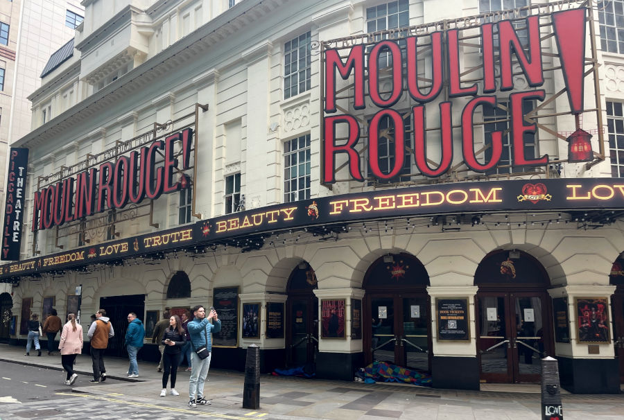 Picadilly Theatre with Moulin Rouge ad